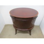 An Edwardian Sheraton revival inlaid mahogany, oval cellette with a crossbanded, hinged top