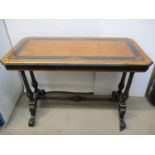 A Victorian, ebony and boxwood inlaid, burr walnut, gilt and ebonized centre table, with turned,