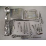 Mixed silver items to include a cigarette case, a caddy spoon, button hooks, a trinket box and a