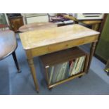 A walnut hall table with turned legs and single drawer