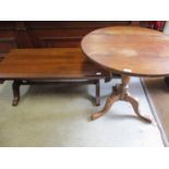 A reproduction mahogany coffee table with drop leaf sides, together with a circular occasional table