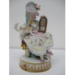 A mid 19th century Meissen figure, first modelled by Acier, of a seated girl with a dog on her