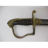 A British 1796 pattern officers sword with a gilt brass lions head pommel, knuckle guard, lions head