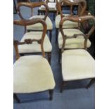A set of six Victorian kidney backed rosewood dining chairs