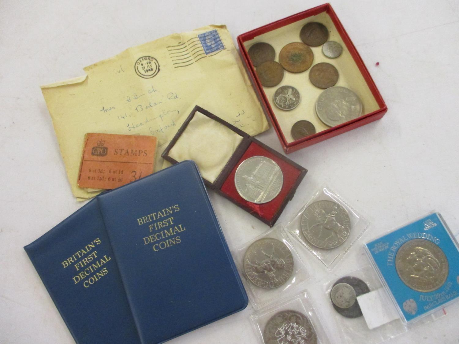 Mixed coins and loose stamps to include two commemorative decimal coin sets