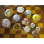 A group of 19th century and later porcelain miniature cabinet, cups and saucers and miniature plates