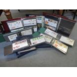 A collection of nine albums of first day covers to include first day stamps commemorating D-Day