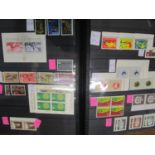 A stamp album of mainly mint unmounted stamp of Luxembourg, Liechtenstein and Andorra