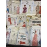 Vintage Vogue seamstress patterns, 3 vintage fur ladies hats, a vintage case, a mirror A/F and a