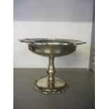 A silver tazza with a reeded rim and pedestal foot, 157g