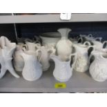 A quantity of Parian ware to include Portmerion jugs