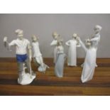 Six Lladro figures to include mainly children in different poses and a GDR figure of a fisherman