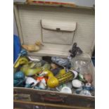 A mixed lot to include a vintage suitcase, duck ornaments, Poole pottery and other items