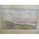 An early 20th century landscape watercolour depicting birds with mountains to the back ground,