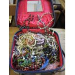 A large collection of vintage bead necklaces and bracelets to include Venetian beads housed with a