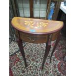 A modern inlaid demi lune occasional table with brass mounts, 27" h x 20" w