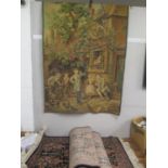 A machine made tapestry with figures and two machine made rugs