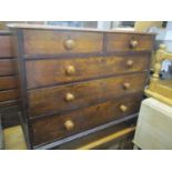 A Victorian oak chest of two short and three long drawers, standing on bracket shaped feet, 35 1/4"h