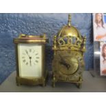 An early 20th century brass carriage clock, together with a Smiths 8 day clock in the form of a