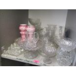 A selection of mixed glassware to include dressing table items, candlesticks and other items