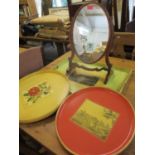 Three vintage trays and an early 20th century mahogany dressing table mirror