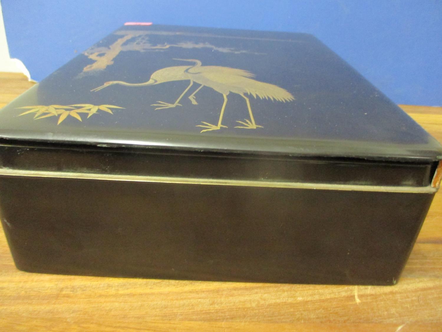 A Chinese lacquered box, A/F, 16" x 11.5" depicting two storks and fauna - Image 2 of 3