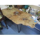 An elm and resin infilled occasional table on metal pin legs, 13 1/4"h x 39"w