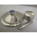 A silver engine turned toothpick holder, together with a napkin ring and an enamel topped lid