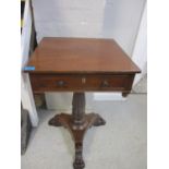 A William IV mahogany work table with a drawer over a carved column and carved paw feet