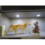 A large Franklin Mint porcelain model of a Bengal tiger with certificate of authenticity , along