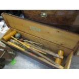 A vintage boxed croquet set