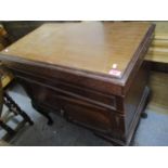 An early 20th century mahogany record cabinet containing record player and mixed records