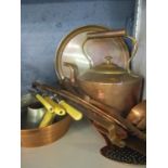 A Victorian copper kettle, ladles and skillet etc