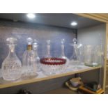 Glassware to include a decanter with a silver topped rim, etched glass bucket and other glassware