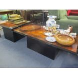 A contemporary ebonized and mixed wood veneered coffee table, 16 1/2" x 48 6/8" x 27 2/8" and a