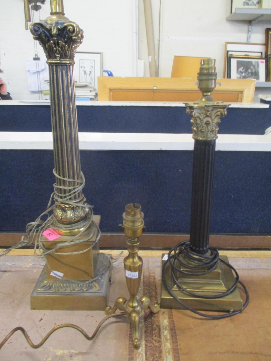 Two brass Corinthian column table lamps and one other smaller lamp