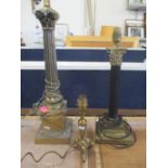 Two brass Corinthian column table lamps and one other smaller lamp