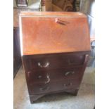 An Edwardian mahogany Sheraton revival bureau having fall flap above three drawers, 38" h x 24" w