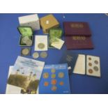 A quantity of British coins to include crowns, decimal coin presentation packs and various late 20th