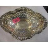 A monogrammed and pierced silver sweet bowl