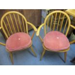 A pair of Ercol armchairs