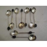 A set of eight silver coffee bean spoons
