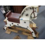 A vintage wooden rocking horse