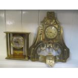 An Art Nouveau brass mantle clock fitted with an 8 day movement, together with a Linden alarm clock