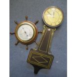 An early 20th century Gilbert wall clock, together with a wheel barometer