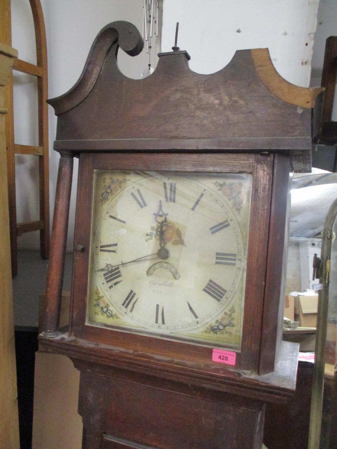 A 19th century oak long case clock with a 30-hour bell strike movement 77"h x 18 1/4"w