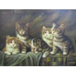 A small oil painting depicting kittens in an interior barn scene, unsigned, 8" x 10", gilt frame