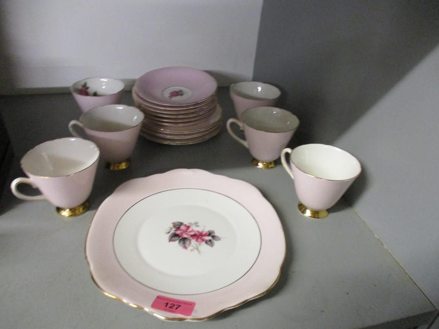 An old Royal One china tea set decorated with roses