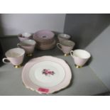 An old Royal One china tea set decorated with roses