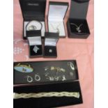 Costume jewellery to include silver charms and a silver bracelet